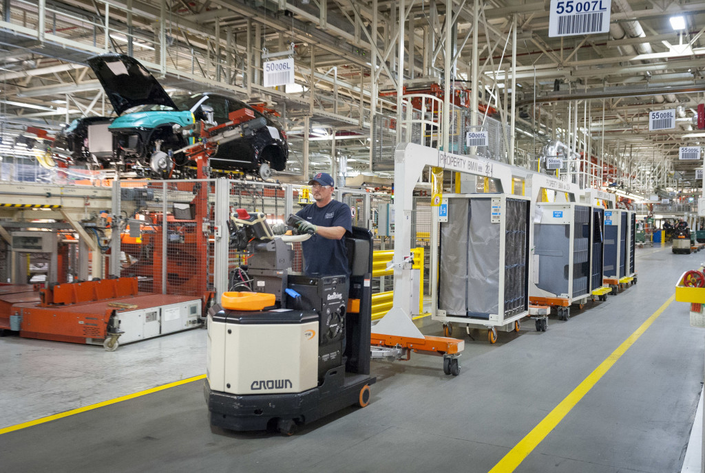 A BMW team member at the BMW Plant in Spartanburg, SC, drives a hydrogen-powered fuel cell  material handling train. BMW Manufacturing announced on Wednesday, March 13, 2013 the successful expansion of the company’s hydrogen fuel-cell material handling equipment across its 4. million square foot production facility.(File Photo/BMW Manufacturing via newscast)